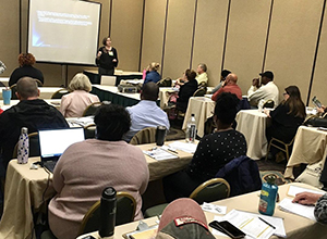 North Carolina social worker Jessica Holton presents at the North Carolina Foundation for Alcohol and Drug Studies Winter School Conference in February 2020